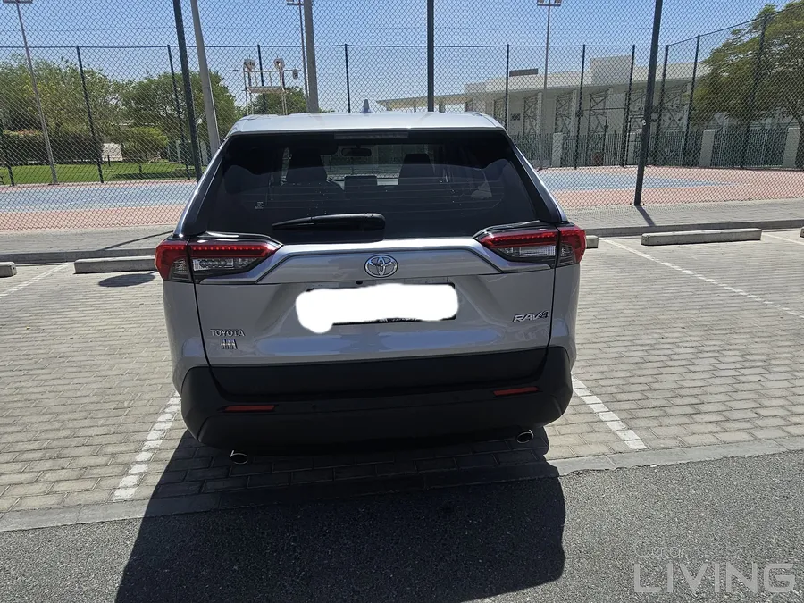 Low mileage Rav4 with rear view camera, sensor and floor mat protection.