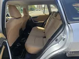 Low mileage Rav4 with rear view camera, sensor and floor mat protection.