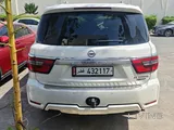 Nissan patrol V8 platinum white fully loaded under warranty and full insurance 