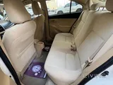 White Toyota Yaris – Smooth, Reliable, Family-Owned